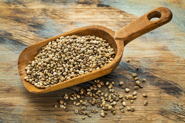 a rustic scoop of hemp seeds