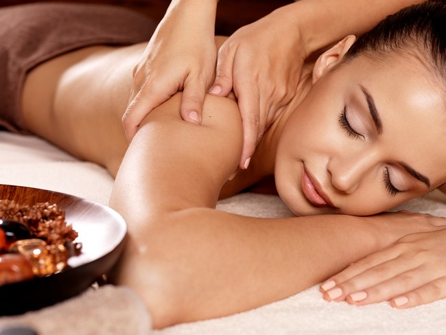Woman Having Massage In The Spa Salon