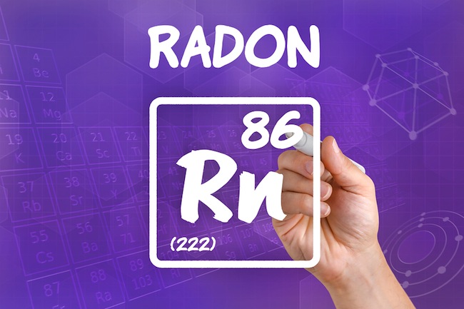 Hand drawing the symbol for the chemical element radon