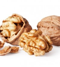 walnut and a cracked walnut isolated on the white background