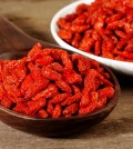 Red Dried Goji Berries In Wooden Spoon