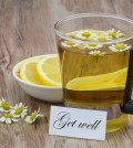 Get well card, chamomile tea and fresh lemon