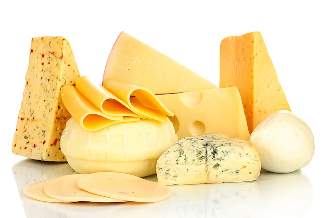 Various types of cheese isolated on white