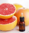 bottle of grapefruit essential oil - beauty treatment