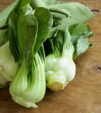 Bok choy (chinese cabbage) on a wooden table