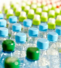 Image of many plastic bottles with water in a shop